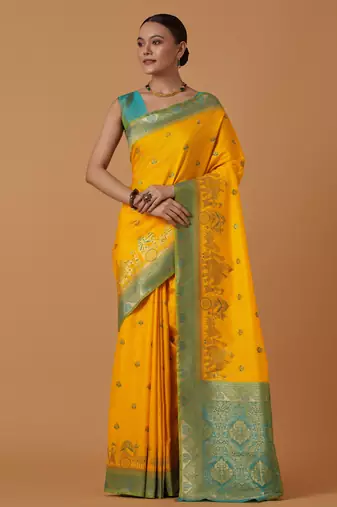 yellow silk blend banarasi jacuard work saree with unstitched blouse piece