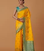 yellow silk blend banarasi jacuard work saree with unstitched blouse piece