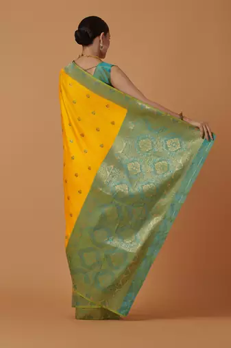 yellow silk blend banarasi jacuard work saree with unstitched blouse piece