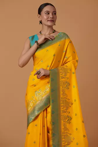 yellow silk blend banarasi jacuard work saree with unstitched blouse piece