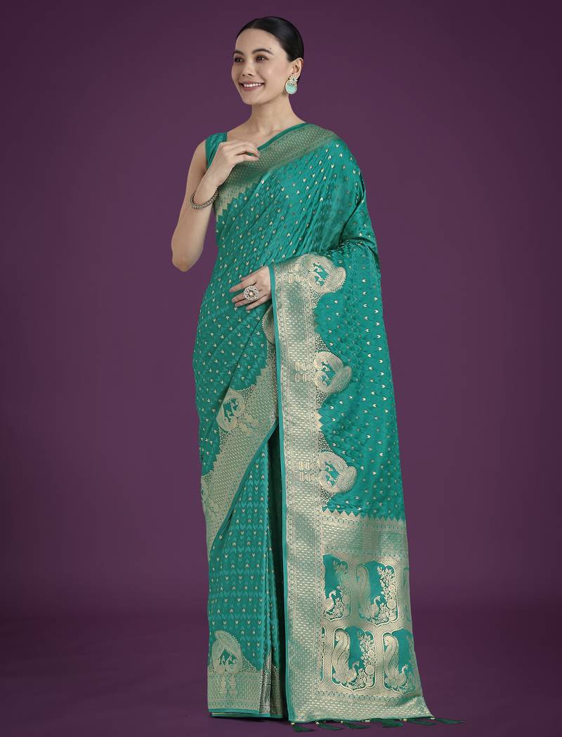 teal green silk blend banarasi jacuard work saree with unstitched blouse piece