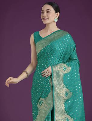 teal green silk blend banarasi jacuard work saree with unstitched blouse piece 4