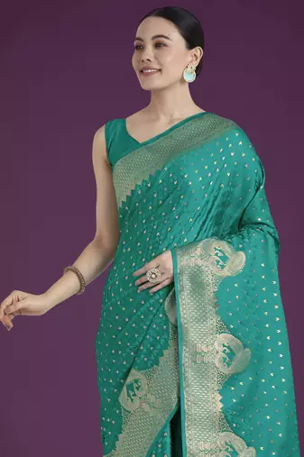 teal green silk blend banarasi jacuard work saree with unstitched blouse piece