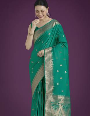 teal green silk blend banarasi jacuard work saree with unstitched blouse piece 4