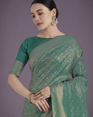 rama silk blend banarasi jacuard work saree with unstitched blouse piece 4