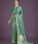 teal green silk blend banarasi jacuard work saree with unstitched blouse piece