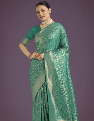 teal green silk blend banarasi jacuard work saree with unstitched blouse piece 4