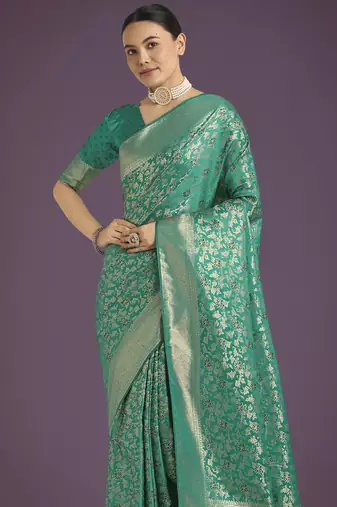 teal green silk blend banarasi jacuard work saree with unstitched blouse piece