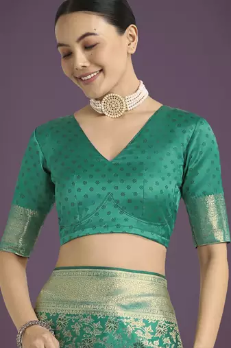 teal green silk blend banarasi jacuard work saree with unstitched blouse piece