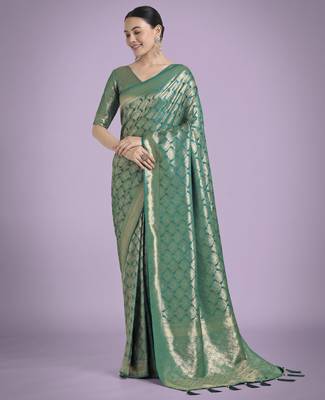 teal green silk blend banarasi jacuard work saree with unstitched blouse piece 1