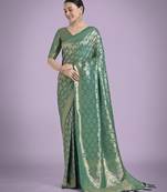 teal green silk blend banarasi jacuard work saree with unstitched blouse piece