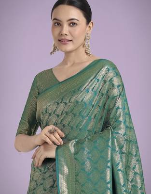 teal green silk blend banarasi jacuard work saree with unstitched blouse piece 4