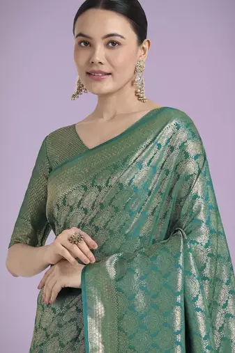 teal green silk blend banarasi jacuard work saree with unstitched blouse piece