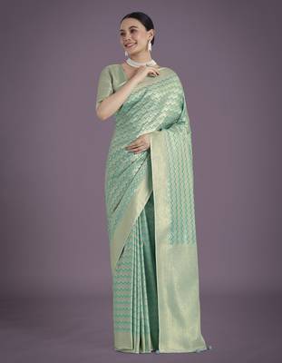 rama silk blend banarasi jacuard work saree with unstitched blouse piece 2