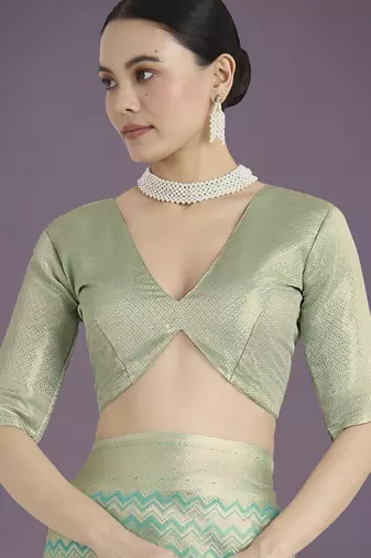 rama silk blend banarasi jacuard work saree with unstitched blouse piece