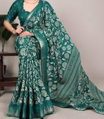 Green art silk printed saree with floral print