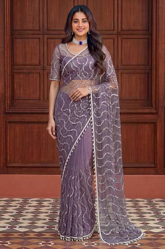 Purple net embroidered saree with sequins work
