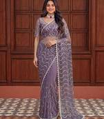 Purple net embroidered saree with sequins work