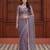 Purple net embroidered saree with sequins work