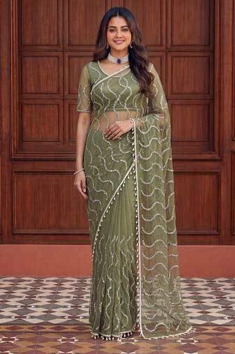 Green net embroidered saree with sequins work