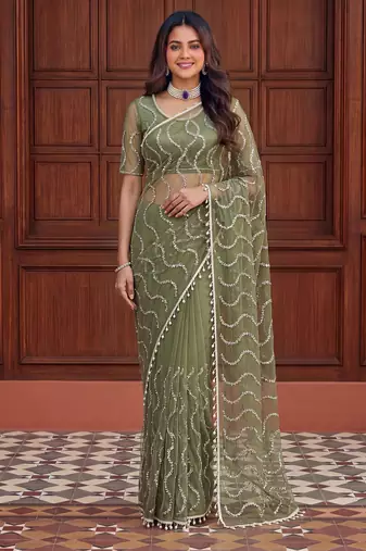 Green net embroidered saree with sequins work
