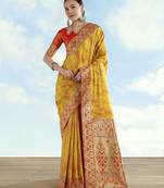 yellow silk blend banarasi jacuard work saree with unstitched blouse piece
