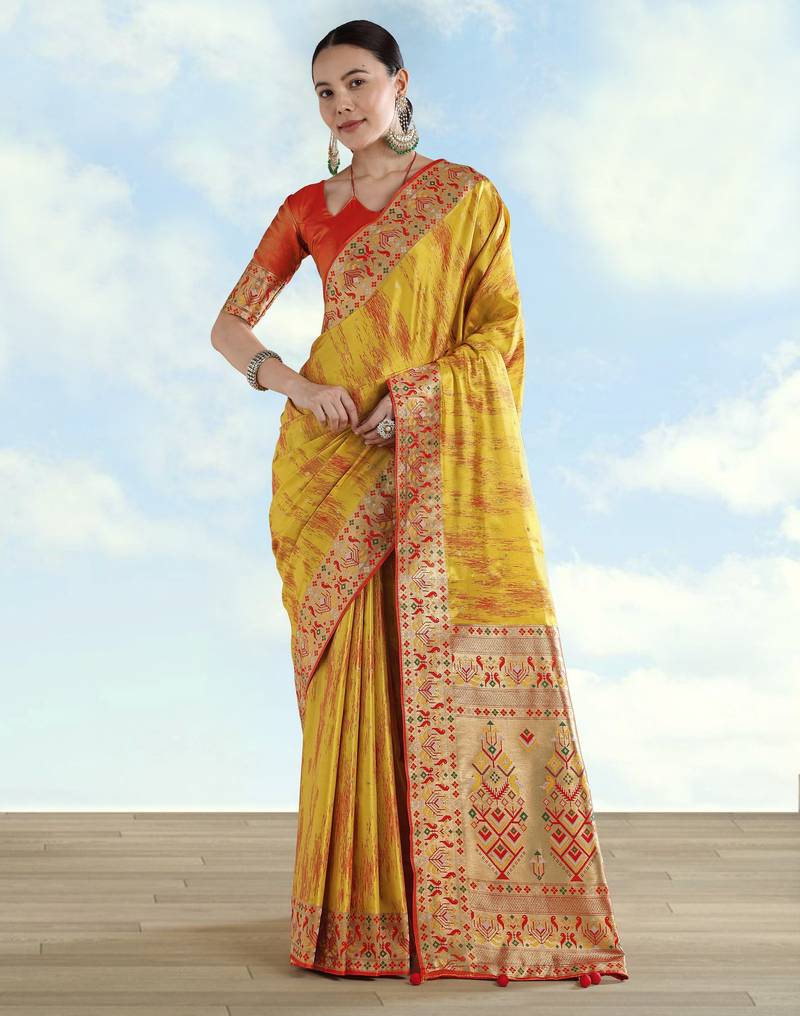 yellow silk blend banarasi jacuard work saree with unstitched blouse piece
