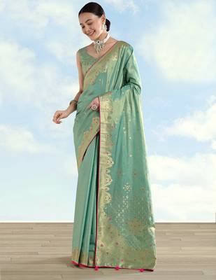 rama silk blend banarasi jacuard work saree with unstitched blouse piece 1