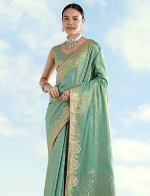 rama silk blend banarasi jacuard work saree with unstitched blouse piece 4