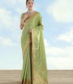 pista silk blend banarasi jacuard work saree with unstitched blouse piece