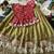 Kids moss satin elephant motif cutdana work lehenga with zari silk peplum blouse