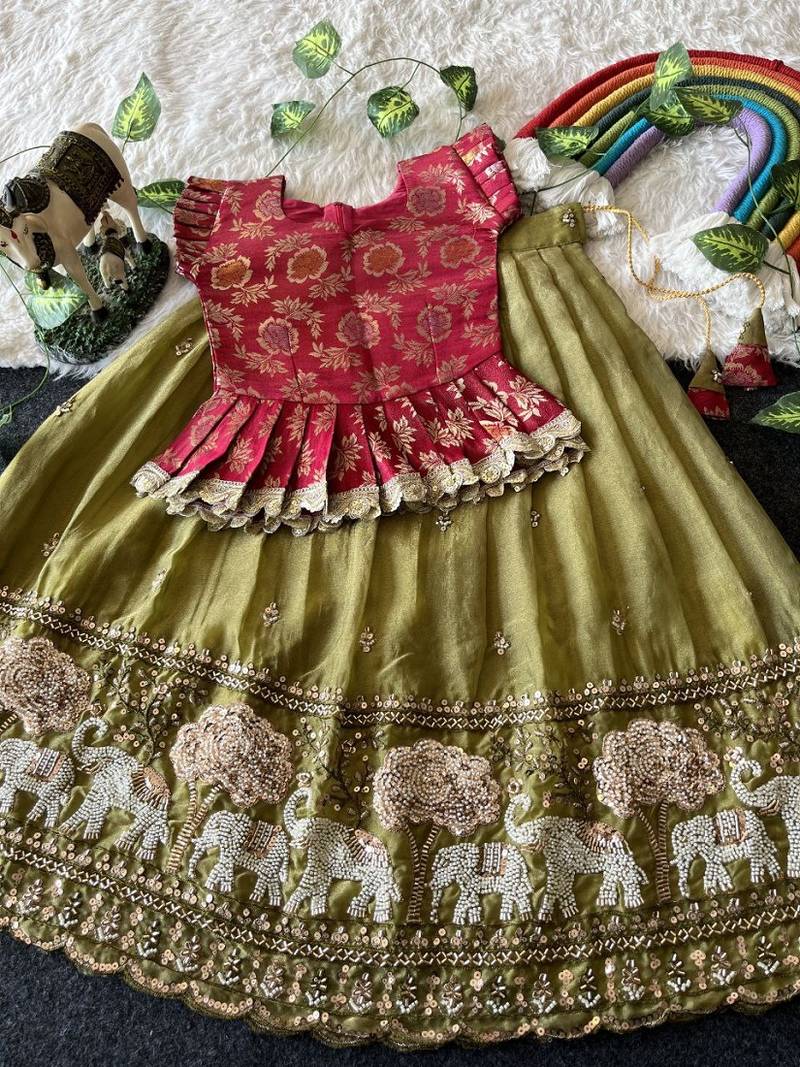 Kids moss satin elephant motif cutdana work lehenga with zari silk peplum blouse