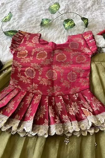 Kids moss satin elephant motif cutdana work lehenga with zari silk peplum blouse