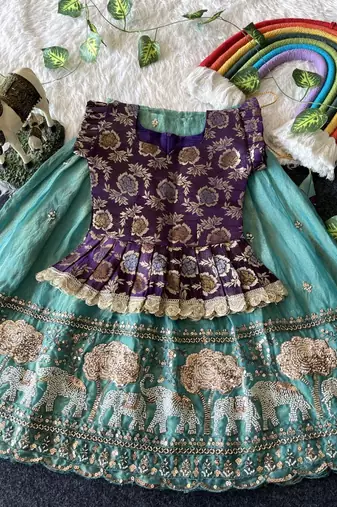 Kids moss satin elephant motif cutdana work lehenga with zari silk peplum blouse