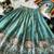 Kids moss satin elephant motif cutdana work lehenga with zari silk peplum blouse