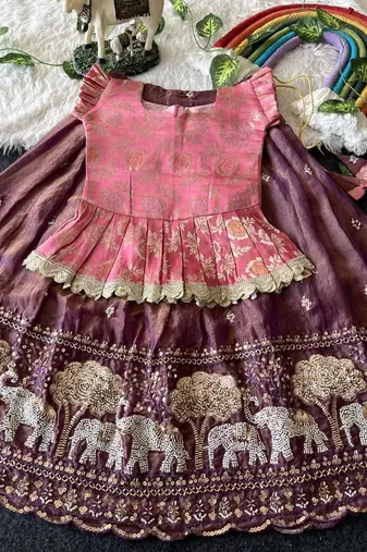 Kids moss satin elephant motif cutdana work lehenga with zari silk peplum blouse