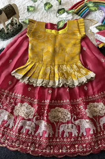 Kids moss satin elephant motif cutdana work lehenga with zari silk peplum blouse