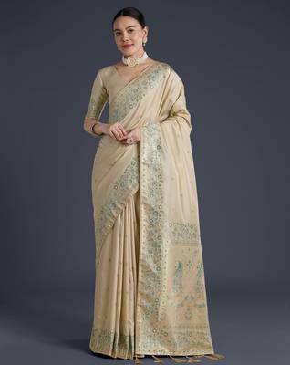 cream silk blend banarasi jacuard work saree with unstitched blouse piece 1