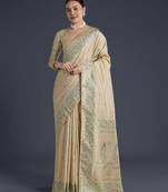 cream silk blend banarasi jacuard work saree with unstitched blouse piece