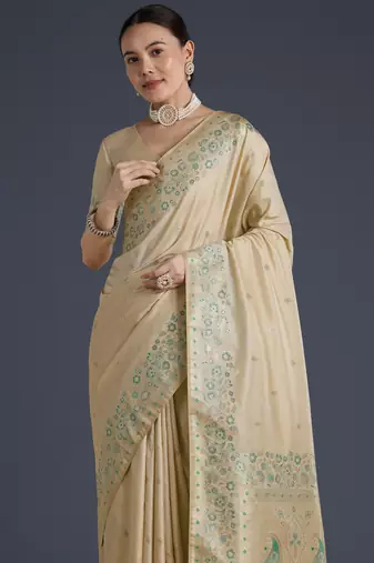 cream silk blend banarasi jacuard work saree with unstitched blouse piece