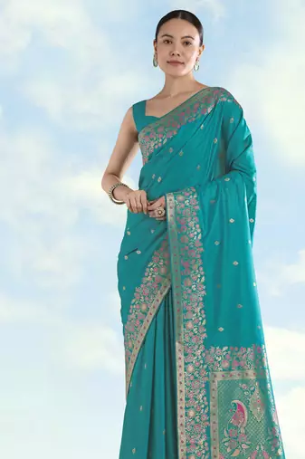 Rama banarasi silk blend jacuard work saree with unstitched blouse piece