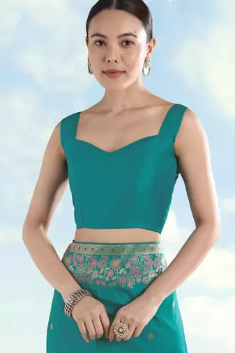 Rama banarasi silk blend jacuard work saree with unstitched blouse piece