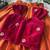 Orange fendy silk embroidered lehenga with red velvet work blouse for kids