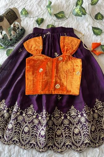 Purple fendy silk embroidered lehenga with orange velvet work blouse for kids
