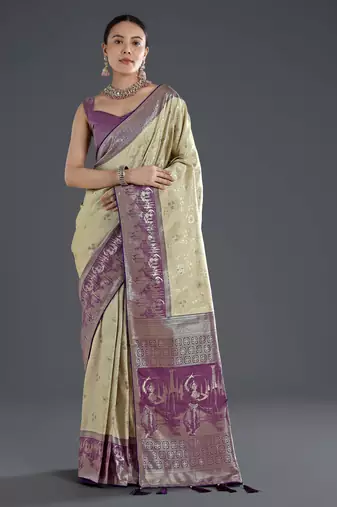 Cream banarasi silk blend jacuard work saree with unstitched blouse piece
