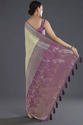 Cream banarasi silk blend jacuard work saree with unstitched blouse piece