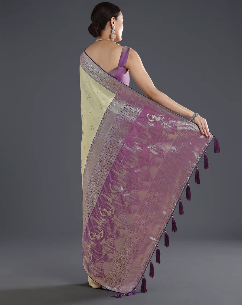Cream banarasi silk blend jacuard work saree with unstitched blouse piece