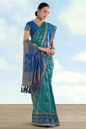 Rama banarasi silk blend jacuard work saree with unstitched blouse piece