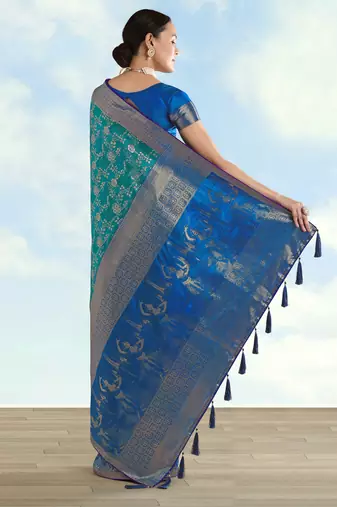 Rama banarasi silk blend jacuard work saree with unstitched blouse piece