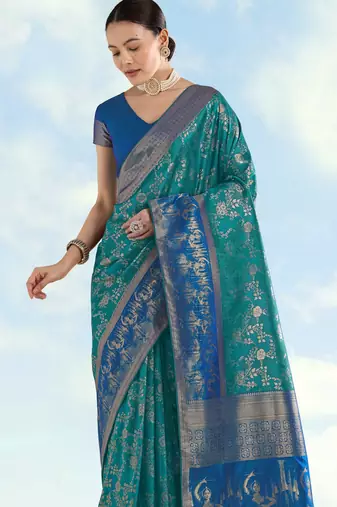Rama banarasi silk blend jacuard work saree with unstitched blouse piece